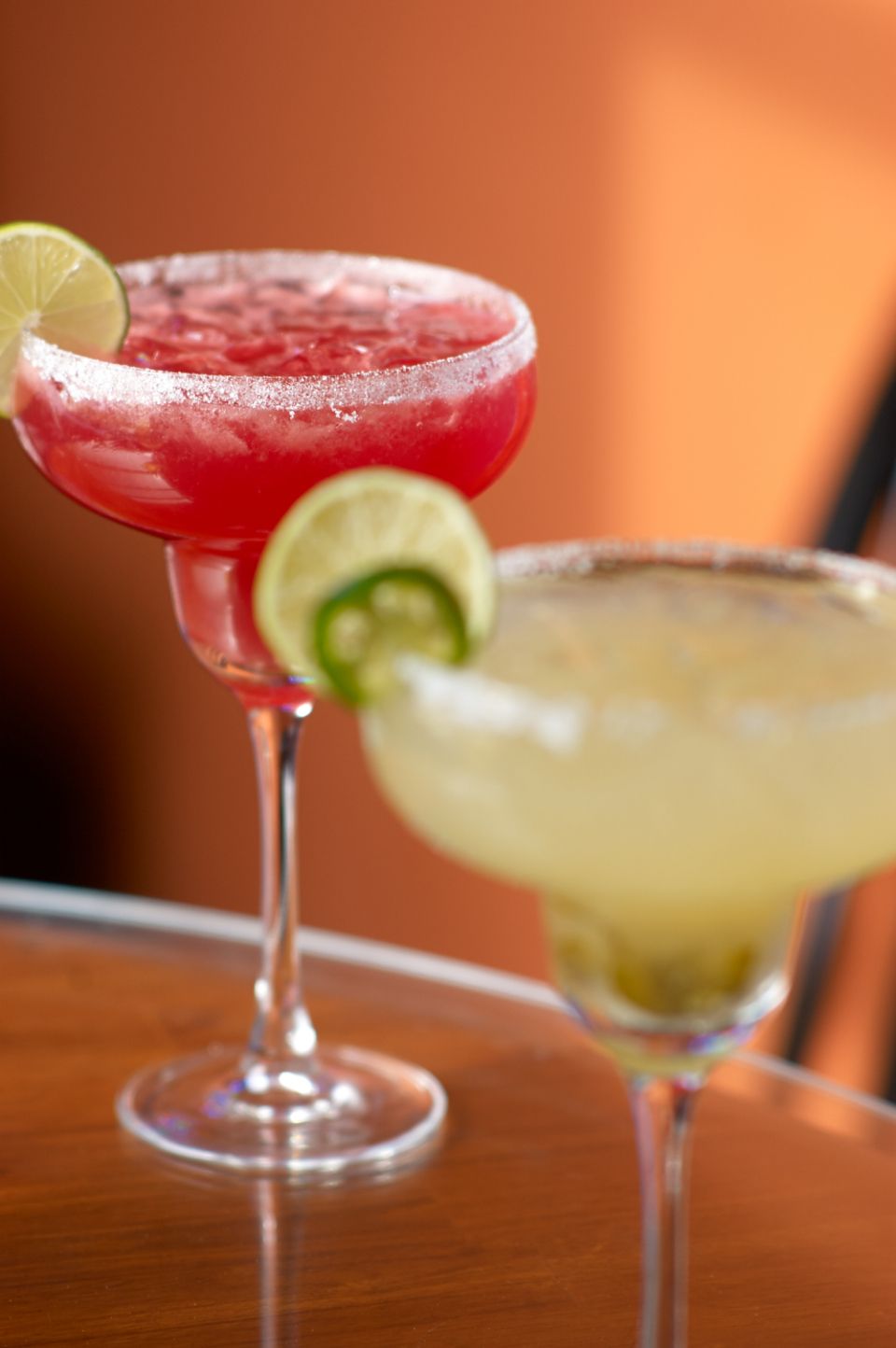A cocktail being finished at the bar